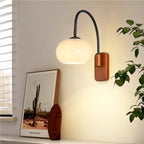 Persimmon Halo Wall Light – Bauhaus Glass Sconce | Adjustable Modern Accent Lighting