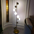 Auric Orbit Floor Lamp – Modern Glass Globe Lighting | Luxury Gold Statement Design